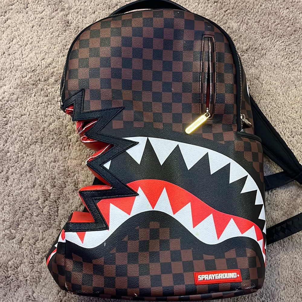 Spraygrounds limited edition leather shark bite book bag